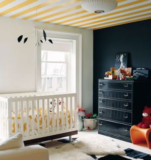 dark nursery with yellow and white striped ceiling.jpg